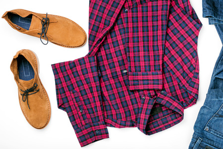Flat lay set mens clothes collage with shirt, jeans and shoes on white backgroundの写真素材