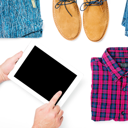 Tablet with copy space on white background with men autumn clothes collage, flat layの写真素材
