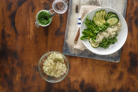Top view detox salad on dark wooden background with copy spaceの写真素材