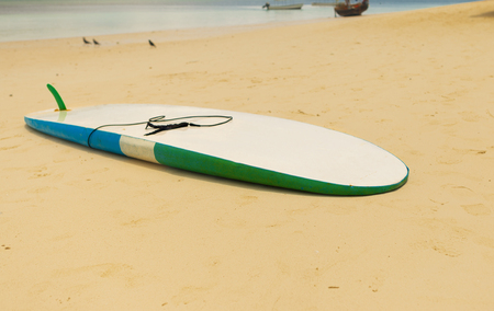 Surfboard in the sand at the beach. Summer backgroundの写真素材