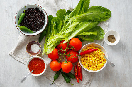 Top view set raw food for cooking taco salad white wooden tableの写真素材