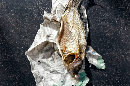 Top view dried fish on dark blue background top viewの写真素材