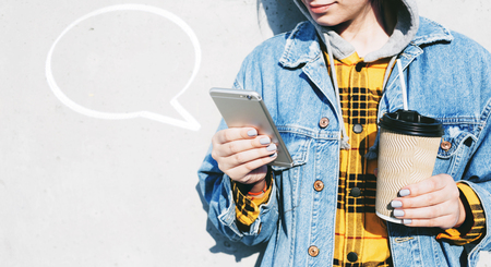 Social network. Young women using phones to communication in live chat chatting in real timeの写真素材