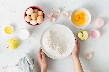 Baking ingredients cooking dough for homemade apple pie.の写真素材