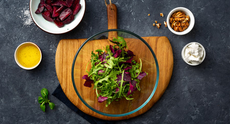 Ingredients for cooking diet summer healthy food top view. preparation salad with baked beetsの写真素材