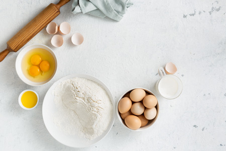 Dough ingredients on a white  top viewの写真素材