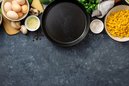 Healthy breakfast top view with empty cooking pan and ingredient for cooking.の写真素材