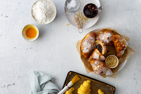 Fresh croissants with chocolate on a white  top viewの写真素材