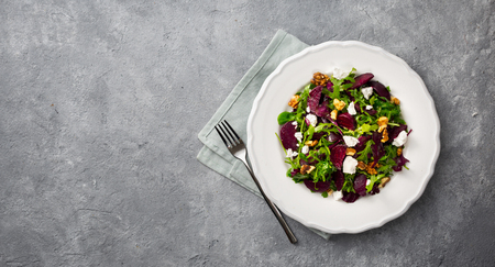 Salad plate on a dark  top viewの写真素材