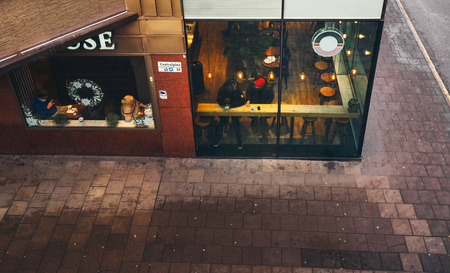 People having lunch in cafe on the streets of Stockholm, Swedenのeditorial素材