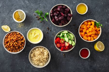 Cooking healthy vegetarian food top view. Set of  ingredients for preparation vegan dishes flat layの写真素材
