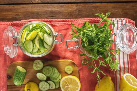 Cooking detox water cucumber drink top view. Dieting conceptの写真素材
