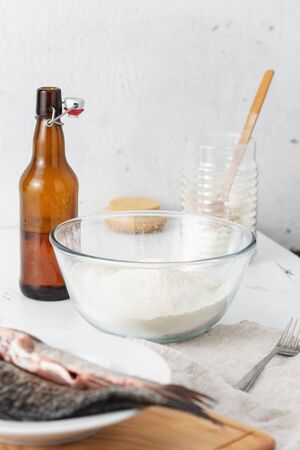 Cooking French beer batter for fish. Preparation tasty and healthy foodの写真素材