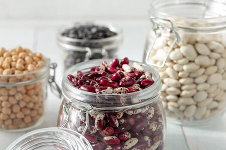 Raw grain bean in a glass jar. Source of protein for a vegetarianの写真素材