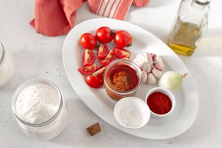 Ingredients for cooking spicy sauce Bravo Spanish cuisine top viewの写真素材