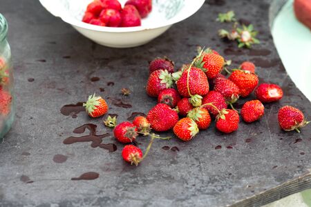 Homemade strawberries on table close up rustic styleの写真素材