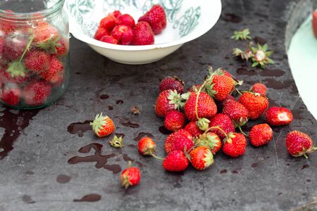 Homemade strawberries on table close up rustic styleの写真素材
