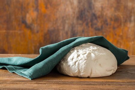 Cooked fresh dough for baking homemade breadの写真素材