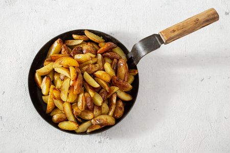 Fried potatoes with brava sauce on a white background top viewの写真素材