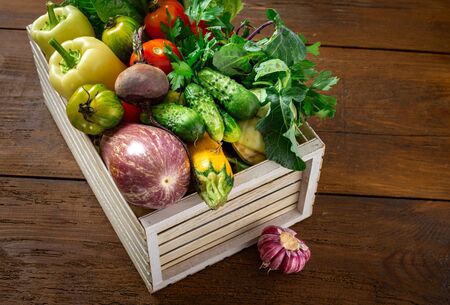 Wooden box with different vegetables. Harvesting conceptの写真素材