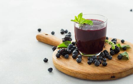 Healthy clean eating concept Blackberry and blueberry summer smoothieの写真素材