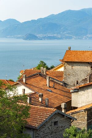 Beautiful sunrise overlooking the Italian village on Lake Comoの写真素材
