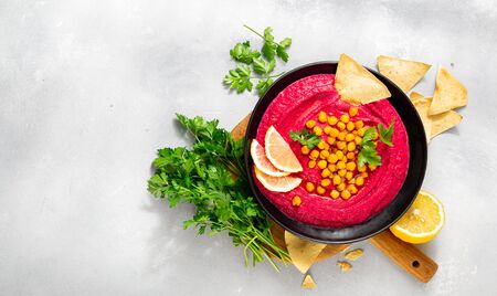 Beetroot hummus in a plate on white background top viewの写真素材