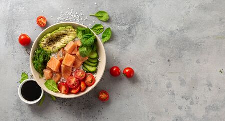 Healthy vegan food concept Poke bowl with salmon, avocado, vegetables and chia seedsの写真素材