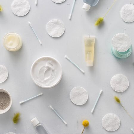 Facial skin care concept. Beauty background with facial cosmetic products on background. Top view, flat layの写真素材