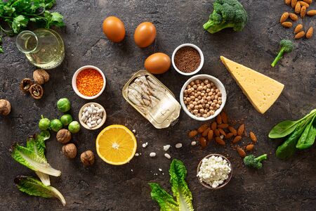 Food sources of omega 3 and healthy fats on dark background top view. Healthy foodの写真素材