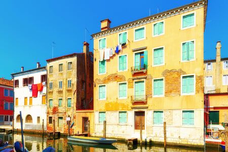 Venice, Italy. Traditional canal street with gondolas and boatsの写真素材
