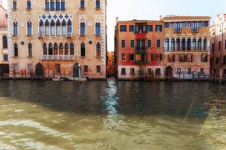 Canal in Venice, Italy with traditional colorful beautiful housesの写真素材