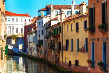 Canal in Venice, Italy with beautiful housesの写真素材