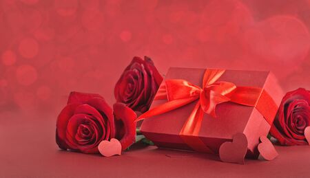 Valentines day concept. Red gift box with red rose and heartの写真素材