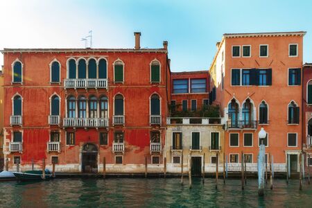 Canal in Venice, Italy with traditional colorful beautiful housesの写真素材