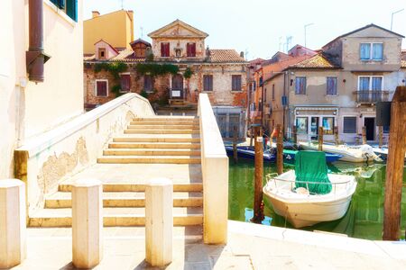 Canal in Venice, Italy with beautiful housesの写真素材