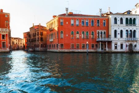 Canal in Venice, Italy with traditional colorful housesの写真素材
