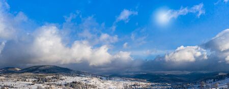 View aerial panorama of the beautiful winter landscape with snowy mountainsの写真素材