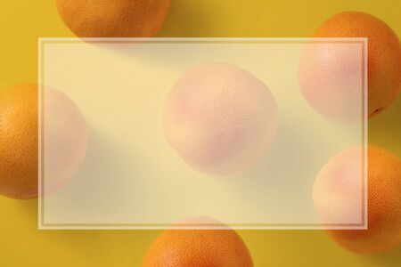 Abstract summer fruit background with copy space. Pattern with grapefruit Top View Flat layの写真素材