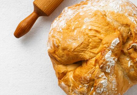 Bread loaf on a white background top viewの写真素材