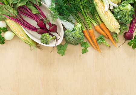 Raw ingredients for cooking vegetarian food on wooden table Healthy vegan meal top viewの写真素材