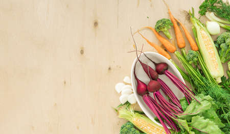 Raw ingredients for cooking vegetarian food on wooden table copy space Healthy vegan meal top viewの写真素材