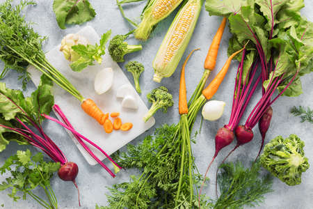 Organic food. Set of ingredients for cooking vegan healthy eating. Fresh farm vegetables top viewの写真素材