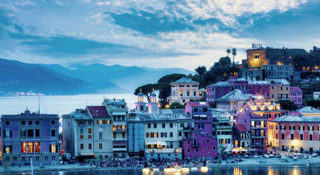 Beautiful evening landscape with beautiful italian houses, Baia del Silenzio, Sestri Levante, Liguria, Italyの写真素材