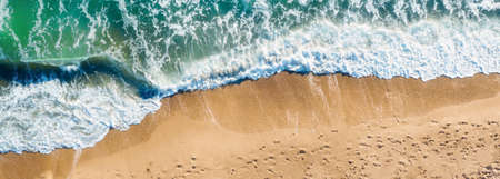 Aerial view seascape with beach and waves. Summer vacation travel and relax backgroundの写真素材