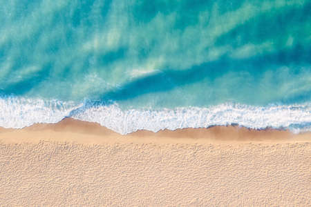 Aerial view tropical landscape with blue water and sandy beach. Clean beach with beautiful water. Vacation travel and relax backgroundの写真素材