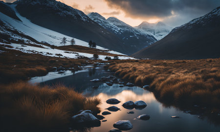 Beautiful landscape image of snow capped mountain range and lake in Glenorchy, New Zealandの素材
