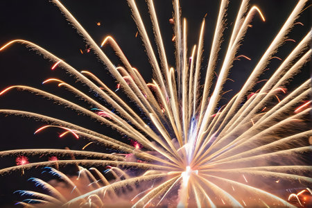 Colorful fireworks of various colors over night sky, celebration and anniversary conceptの素材
