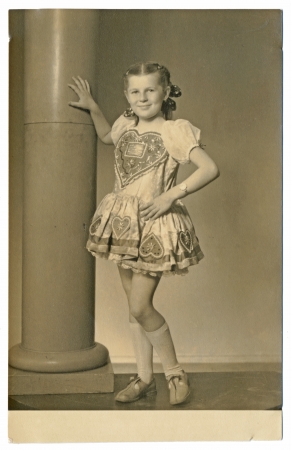 Girl in national costume with a big heart - circa 1955 の写真素材
