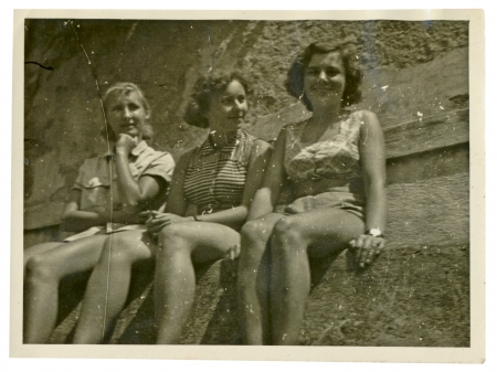 three girls on summer break  in bathing suits  - circa 1945
